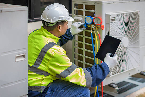 Professional Air Conditioning Repair technician working in Passaic, NJ